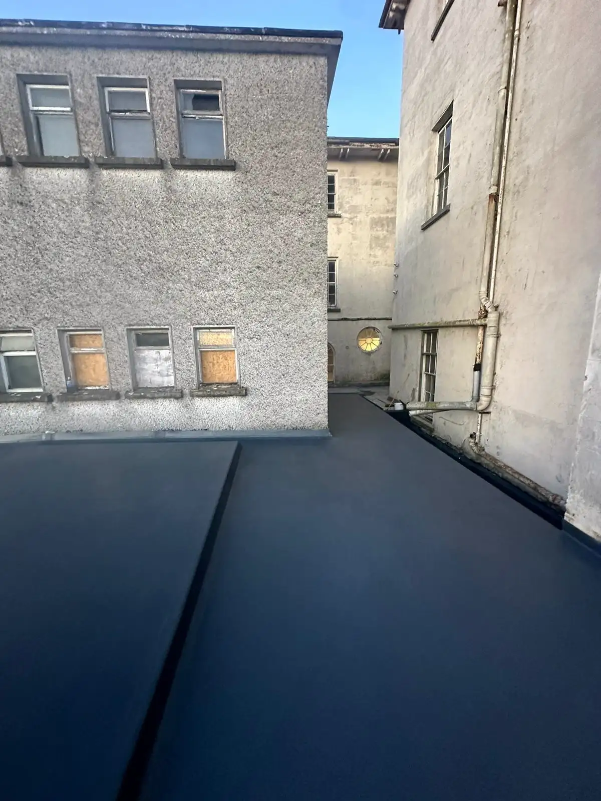 Signs Your Flat Roof Needs Repair or Replacement